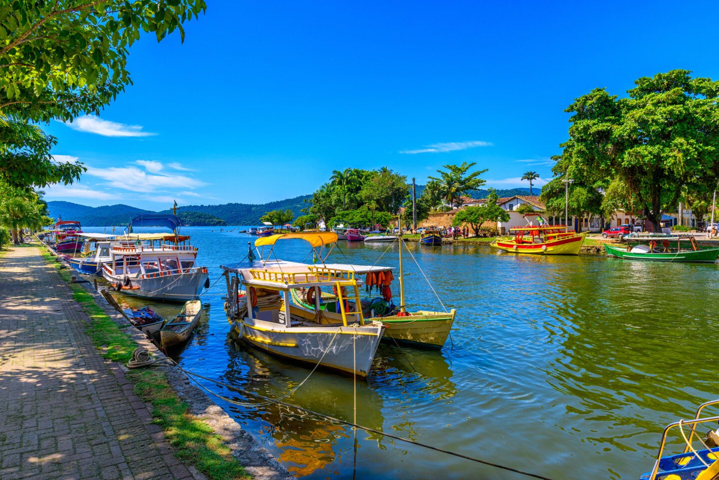 Embankment of historical center with boats in Paraty, Rio de Janeiro, Brazil. Paraty is a preserved Portuguese colonial and Brazilian Imperial municipality