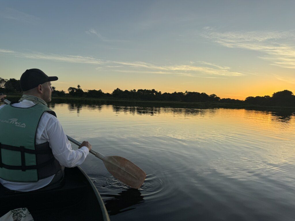 Brazil-Pantanal-Caiman Sunset canoeing